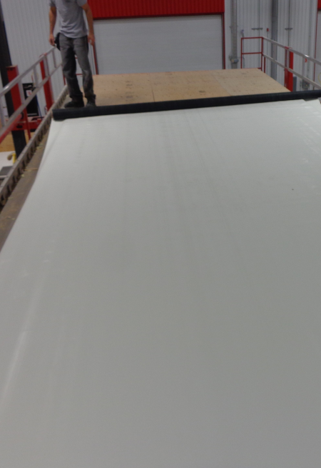 PVC Modular C3 MembraneCustomer install in progress: membrane is positioned prior to applying adhesive.